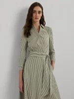 A-line silhouette. Intended to hit below the knee. US size 8 has a 48" body length and a 32.75" sleeve length. Dress length and sleeve length are taken from the center back of the neck. Dress length changes 0.5" between sizes. Sleeve length changes 0.25" between sizes. Point collar. Surplice neckline with a hook-and-eye closure at the center front. Concealed left-side-seam zipper.